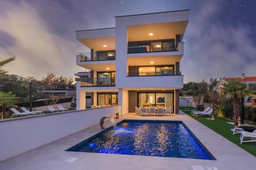 Krk Villa | Deluxe villa with heated pool, whirpool, sea view, beautiful beach IV - by Traveler tourist agency Krk ID 2403