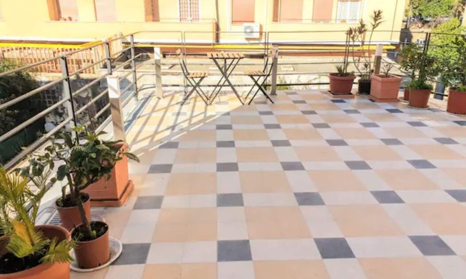 Esquilino Apartment | DESIGN STUDIO WITH TILES TERRACE