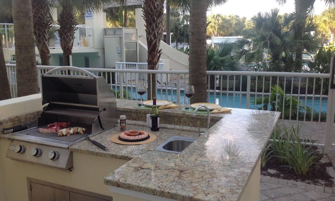 Fort Walton Beach Condo | Destin West Sandpiper L06 ~ Huge Patio W/Tiki Bar and Outdoor Kitchen! Steps to Lazy River
