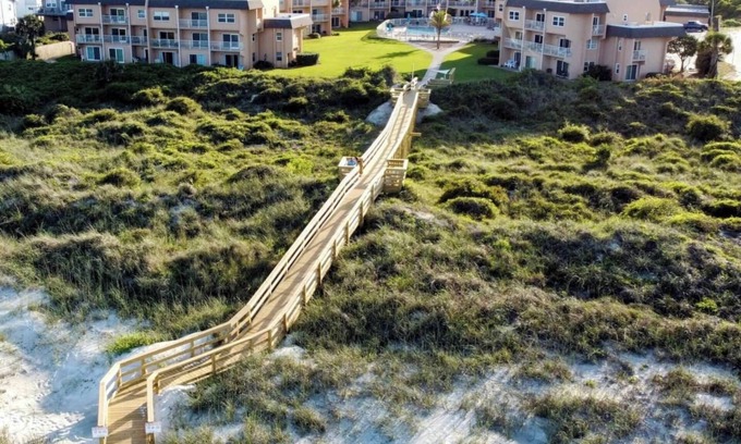Butler Beach Condo | Direct Beachfront Location! Updated, Well Appointed Open Concept Design! Pool!