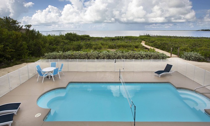 Cudjoe Key House | Direct Ocean View! 5 Bed/3 Bath with room for everyone. Large pool and Dock!