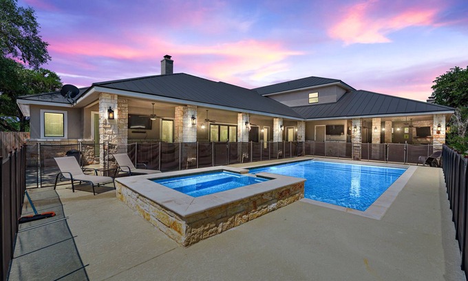 Concan House | Directly ON the Frio River, private golf cart/walking path, hot tub, swimming pool, 3 master suites