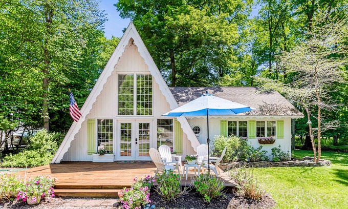 Charlevoix House | Dog-friendly A-frame home near beaches & downtown with firepit, deck, badminton