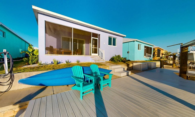 Saint James City House | Dog-friendly, canal-front getaway with a dock, screened lanai, & washer/dryer