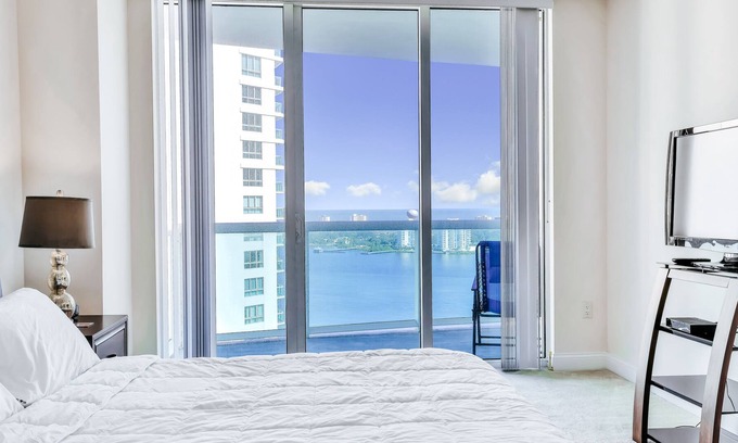 Kingston Condo | Dog-friendly coastal condo near the beach w/ river & ocean views & shared pool!
