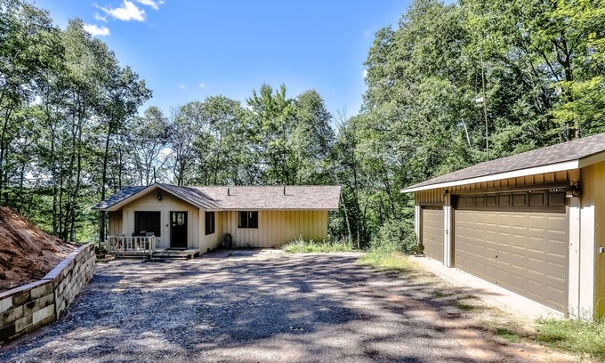 Arbor Vitae House | Dog-friendly, lakefront retreat with a dock, washer/dryer, central AC, & firepit