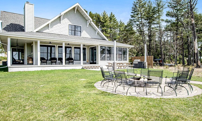 St Germain House | Dog-friendly, lakefront house with beach access, dock, AC, W/D, patio, & firepit