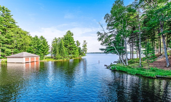 Manitowish Waters House | Dog-friendly, lakefront getaway w/a wraparound balcony, beach, & boat access