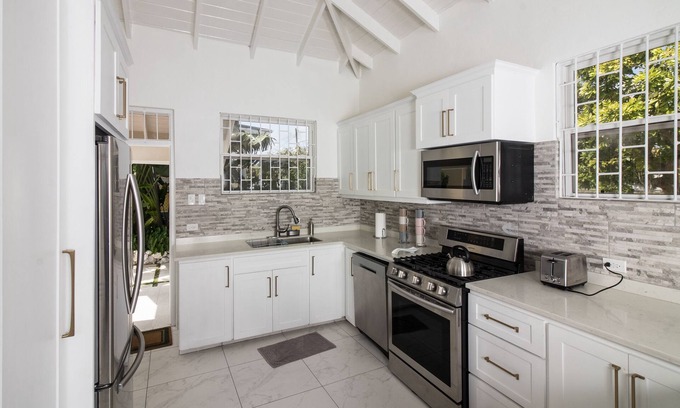 Dover House | Dover Beach Coastal Cottage in lush private grounds.