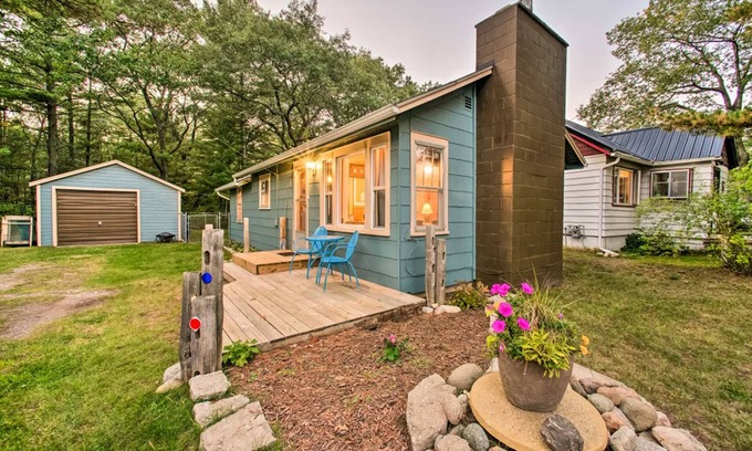 East Tawas House | East Tawas Cabin with Deck, Backyard & Fire Pit!