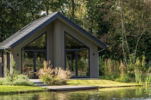 Oirschot House | Eco Villa in Latour by Scenic Pond