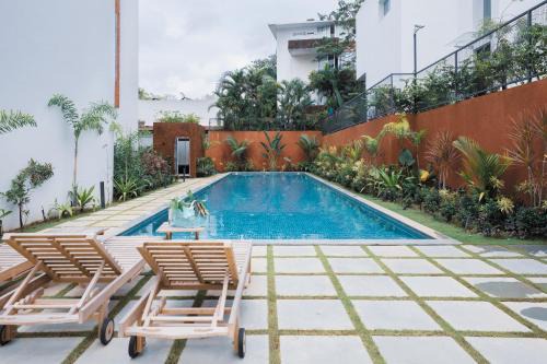 Nerul Apartment | El Volar 2BHK Luxury Apartments 10 Minutes from Candolim Beach with Big common Pool, Fully Equipped Kitchen, 24x7 Security, Wifi