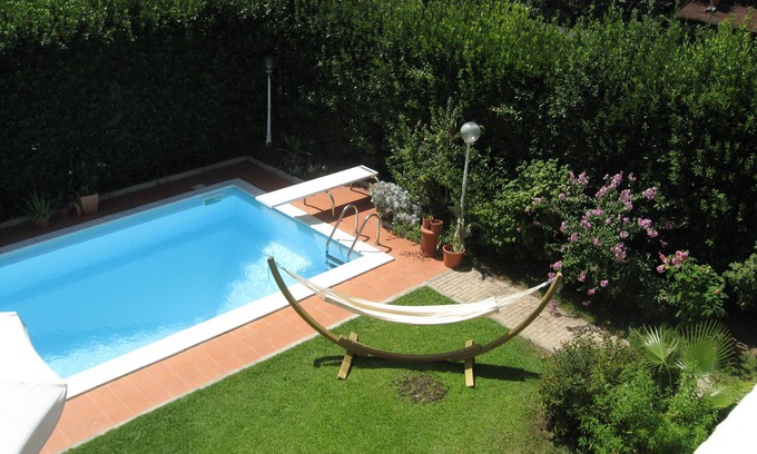 Bolognina Apartment | Elegant city apt., private swimming pool, parking,bikes, wifi, terrace