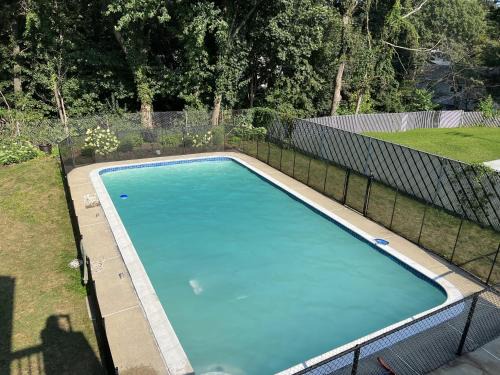 Woburn Villa | Elegant New England Home with Private Pool