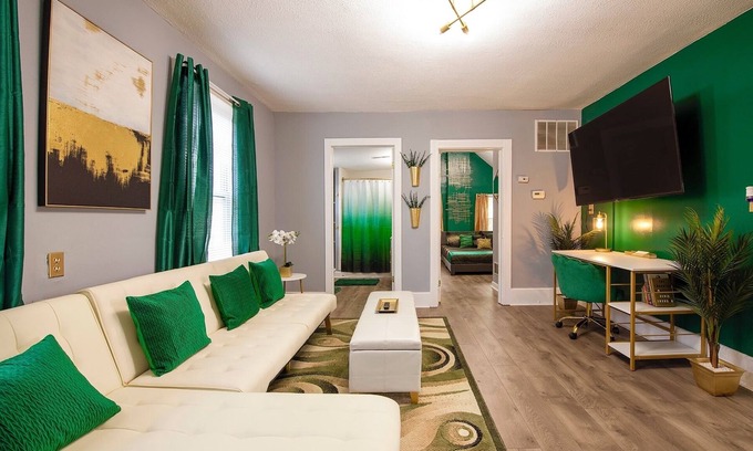 Tremont House | Emerald Oasis: Stunning Tremont 1BR Upper Unit by Christmas Story House | Parking 7 Min to Downtown