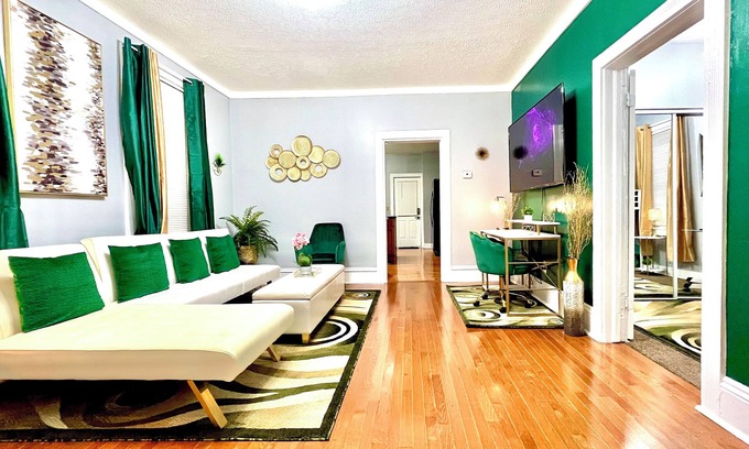 Tremont House | Emerald Oasis: Stylish Tremont 2BR Lower Unit by Christmas Story House | Parking 7 Min to Downtown