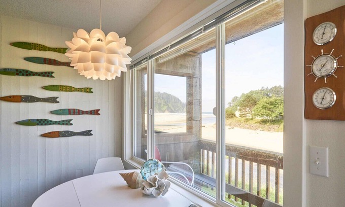 Neskowin Condo | Enjoy a peaceful stay with a view of Proposal Rock on the beautiful Oregon Coast
