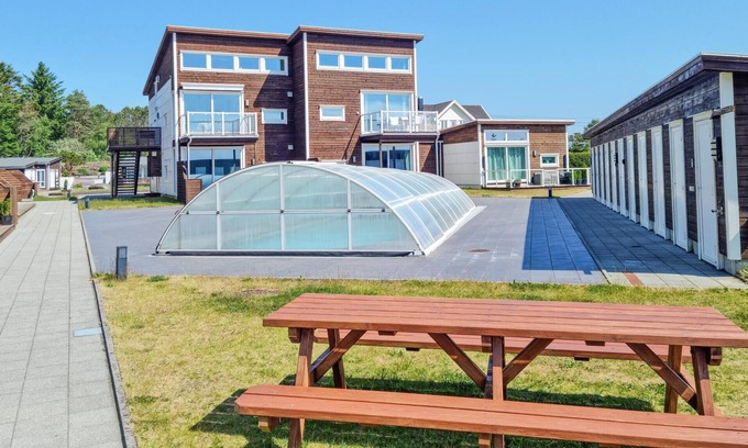 Farsund Apartment | Enjoy a wonderful vacation in this beachfront apartment with pool access.