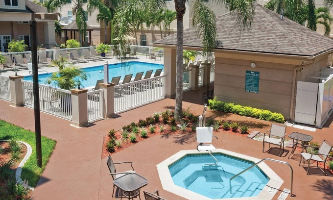 Villas Hotel | Enjoy Free Breakfast and Parking! 4 Classy Units, Steps to Bell Tower Shops!