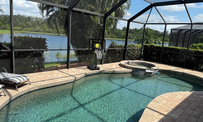 Braden River House | Enjoy it all! 3 BR home, private pool on prestigious River Strand golf course