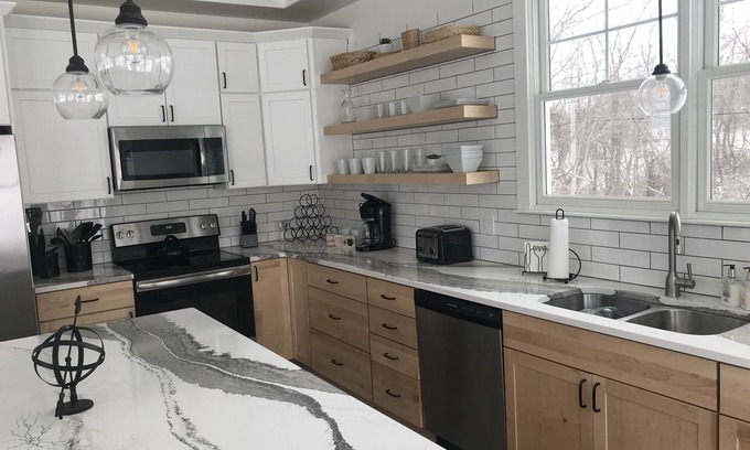 Ludington House | Enjoy spectacular sunsets from high bluff on Lake Michigan!
