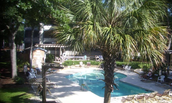 Myrtle Beach Condo | Enjoy the breeze from the screened in porch on summer nights - Summertree F2
