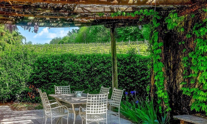 Venegazzu House | Enjoy the view of beautiful vineyards from this semi-detached house.