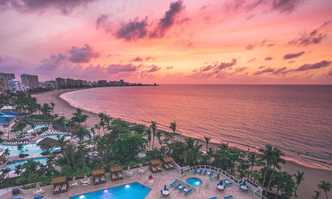 Isla Verde Apartment | ESJ Towers, Ocean Front❤Deluxe two bedrooms✨Hotel Amenities.Best price By Owner!