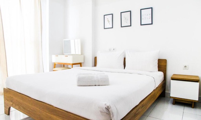 Pagedangan Apartment | Exclusive 1BR Casa De Parco Apartment By Travelio