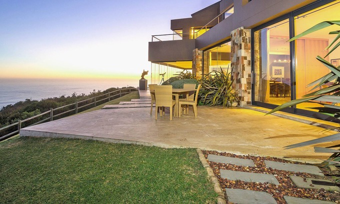 Knysna Villa | Exclusive, Luxurious Villa perched above cliffs with indoor pool & ocean views.
