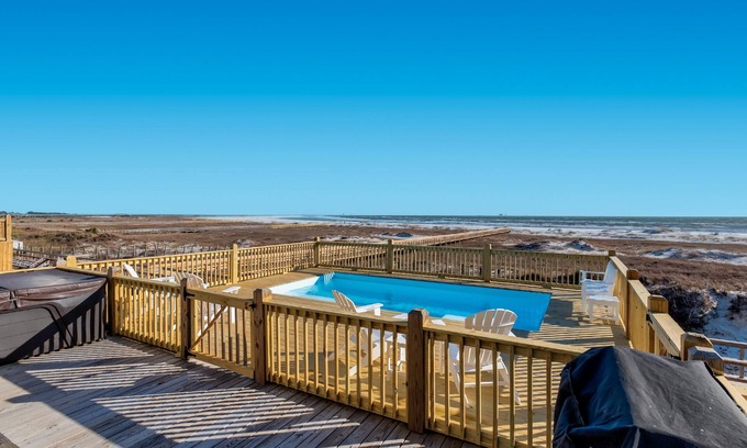 Dauphin Island House | Experience luxury at Blue Pearl, a stunning 5-bedroom beachfront home in Dauphin Island