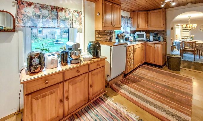 Broby House | Experience the beautiful Helgeå River during a vacation in this vacation home.