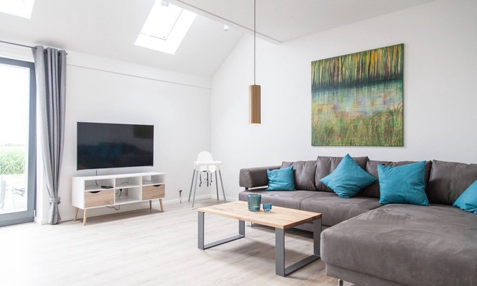 Dornum Apartment | "Experience unforgettable vacation days in nature at Gulfhof Polder72!"