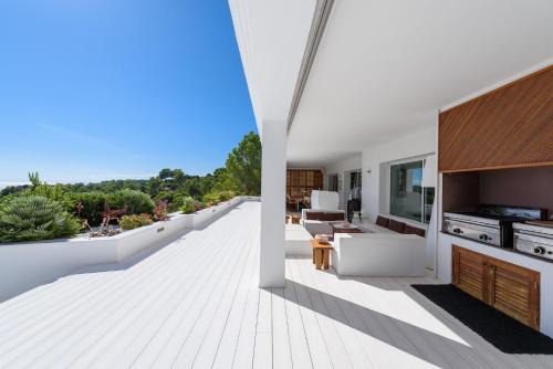 Sant Josep de sa Talaia Villa | Exquisite Ibiza Home I Jaw Dropping Sea Views I Casa Blanca Jondal I 4 Bedrooms I Gym I Outdoor Kitchen I San Jose