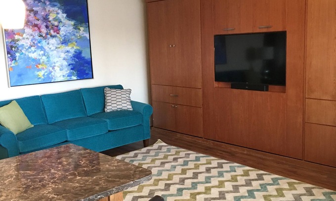 Charlevoix Condo | Fabulous view of Round Lake and Marina from covered deck