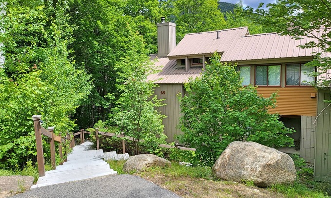 Lincoln House | Family friendly, deck, woods view, AC, pool access, near Loon. C011E by LRS
