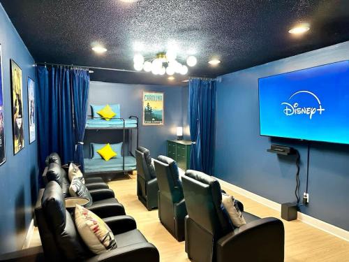 Greensboro House | Family Movie and Game Room 2 King 5 Queen and 2 Twin Beds
