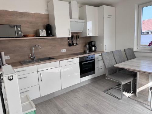 Norddeich Apartment | Ferienhaus Blütenzauber in Norddeich
