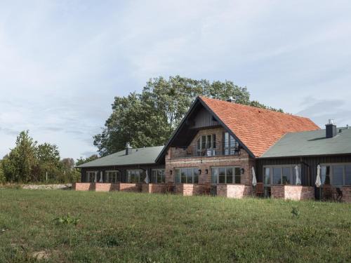 Muritz House | Ferienwohnung mit Kamin im Gut Ulrichshusen