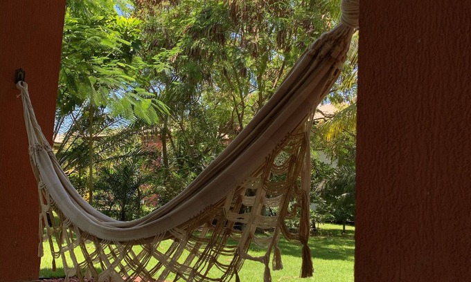 Praia do Forte Apartment | First floor apartment, garden view, peace and quiet for you in Praia do Forte