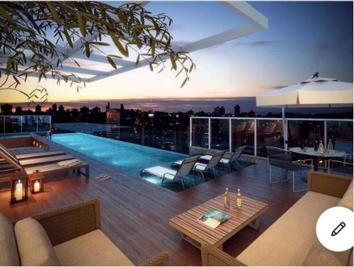 Setor Bueno Apartment | FLAT DIFERENCIADO EM GOIÂNIA, SETOR BUENO, Ed DNA, SACADA PRIVATIVA DESCOBERTA COM JARDIM, PISCINA, ACADEMIA, GARAGEM, MINIMO 2 NOITES