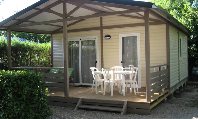 Noves Ski Chalet | Flower Camping le Pilon d'Agel * - Chalet Soléa Comfort 40m2 - 2 bedrooms + air conditioning + TV - of which covered terrace of 13m2 5 people