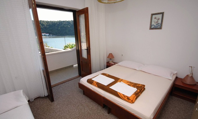 Kampor Apartment | Four-bedroom apartment with terrace and sea view Kampor, Rab (A-5051-a)