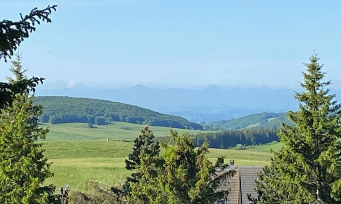Besse-et-Saint-Anastaise Apartment | Apartment with terrace and pool near nature in Super-Besse