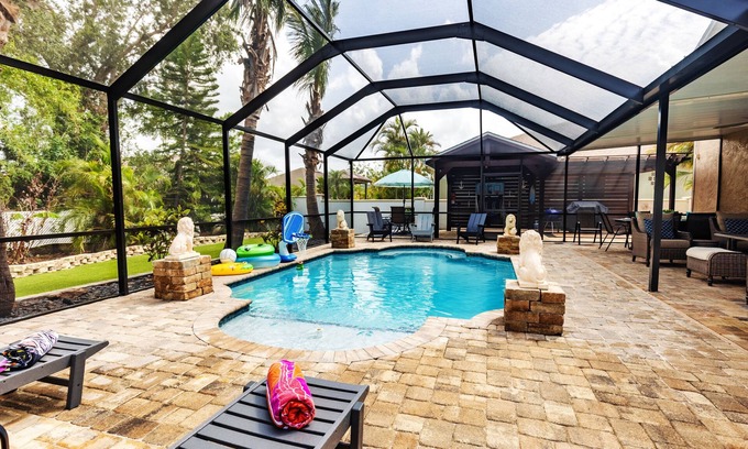 Golf and Sea Village of Apollo Beach House | Free heated pool at Apollo Beach gazebo grill pool table games