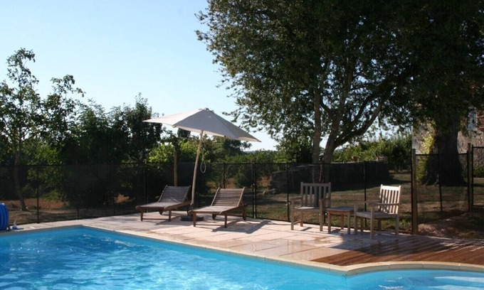 Tocane-Saint-Apre Villa | French country gite with pool, within walking distance of pretty village