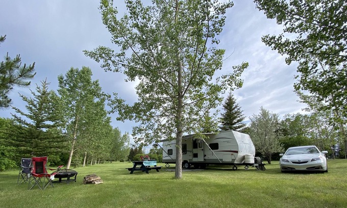 Lyalta House | Fully equipped RV in park-like, treed, private setting!