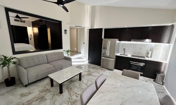 Flamingos Resort | Fully renovated top floor oceanfront condo.