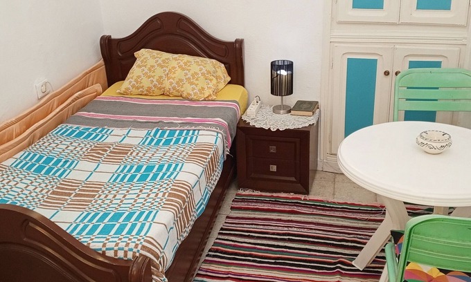 El Halfaouine Apartment | Furnished room with veranda