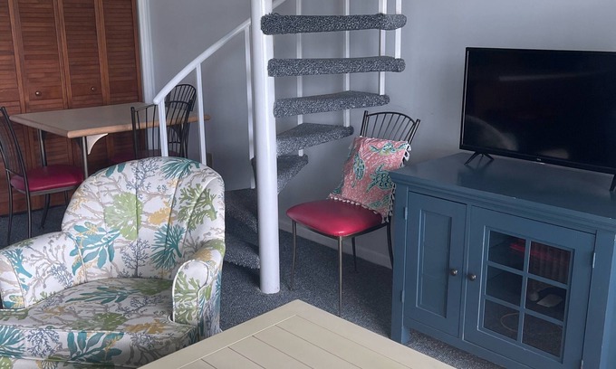 Emerald Isle Condo | Gated community with Indoor and Outdoor Pools.Walk to dining and fun!